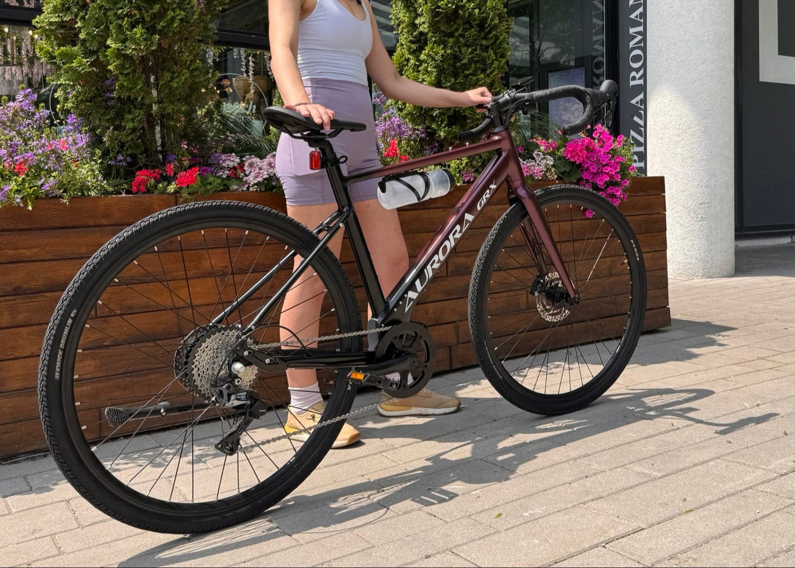 Woman holding Gravel Ebike 